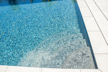 Pool view close up.  Descent down the stairs to the pool.