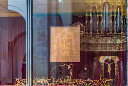 TURIN, ITALY - JULY 14, 2019: Turin Shroud (Italian: Sindone di Torino) is protected by bulletproof glasses in the the Cathedral of Turin, Italy.