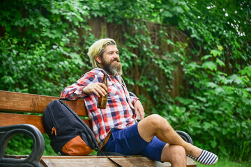 Inspire. Handsome man working on his laptop. business man working outdoors with computer. start...