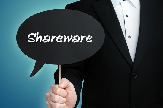 Shareware. Lawyer (Man) holds the sign of a speech bubble in his hand. Text on the label. Blue background
