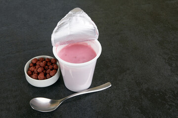 Fruit yogurt on stone