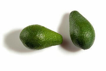 Two ripe fresh avocados