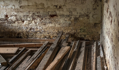 Old planks stored in an old shed