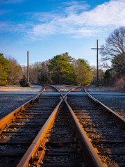 Fototapeta na wymiar Diverging Old Rusted Railroad Tracks on Cape Cod