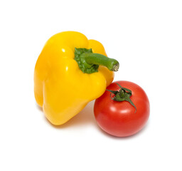 red tomato and yellow pepper on white background