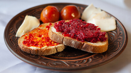 Ordinary Ukrainian food: bread, bacon, tomato, cheese
