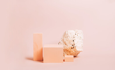 Modern abstract podium stone wooden geometric shapes pastel pink background