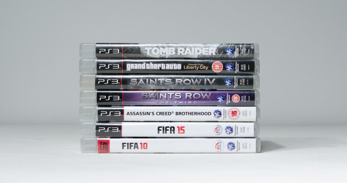 london, england, 08.05.2018 A large pile stack of used  playstation 3 video game cases and dvd games. sony ps3 home arcade system video games.