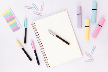 School and office Supplies on a glitter background