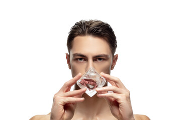 Fototapeta premium Perfection. Portrait of young man isolated on white studio background. Caucasian attractive male model. Concept of fashion and beauty, self-care, body and skin care. Handsome boy with well-kept skin.