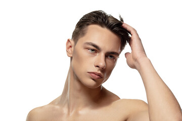 Confidence. Portrait of young man isolated on white studio background. Caucasian attractive male...