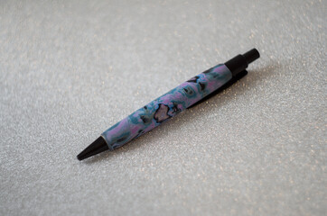 ballpoint pen covered with polymer clay marble