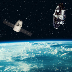 Obraz na płótnie Canvas Satellites above the earth. The elements of this image furnished by NASA.