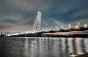 Pivdennyi Bridge at night in Kyiv.