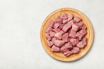 Fresh pork meat on cutting board for cooking