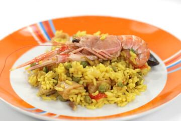 rotisserie prepared Valencian paella risotto with sea fish rotisserie prepared Valencian paella risotto with sea fish
