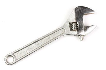 Close-up Adjustable wrench isolated on white background. A metal tool used for screwing the nut.