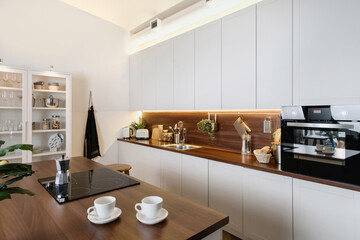 Fototapeta premium Modern kitchen room in new contemporary apartment