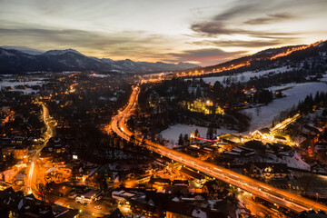 Polish mountains Tatry in Zakopane. Zakopane city at night in winter time in Poland. Night scene in Tatry mountains aerial drone view