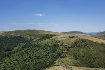 Obraz premium Beautiful highland landscapes in Volcans d'Auvergne regional Natural Park. Massif Central, Auvergne-Rhone-Alpes administrative region, France.