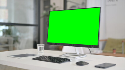 Close Up of Desktop with Green Chroma Key Screen 