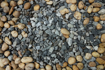 Colorful small pebbles or stones gravel texture or stone in garden with difference color.