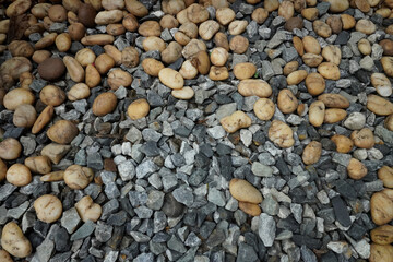 Colorful small pebbles or stones gravel texture or stone in garden with difference color.