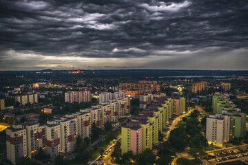 Fototapeta na wymiar Dark sky, with black scary clouds above the city. Dabrowa gornicza, silesia, Poland, aerial drone view