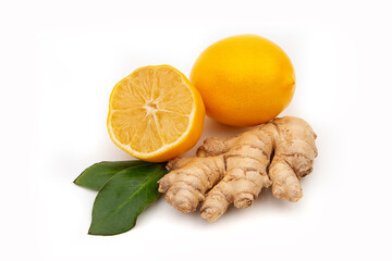 Isolated pieces of ginger and lemon. Natural medicine, anti-influenza and antiviral ingredients on a white background.