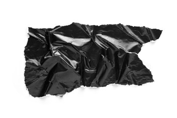 Torn and crumpled piece of black glossy magazine paper isolated on white background. Copy space for text.