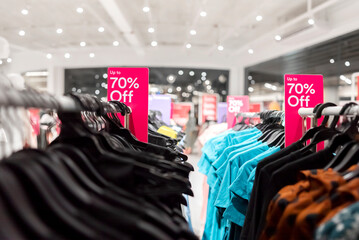 Big sale tag announcement at clothes shop, Black friday and shopping concept, Red tag 70 percent...