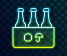 Glowing neon line Pack of beer bottles icon isolated on black background. Case crate beer box sign. Vector.