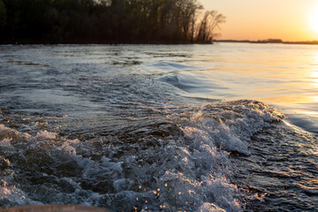 Fototapeta premium waves from the motor on the river