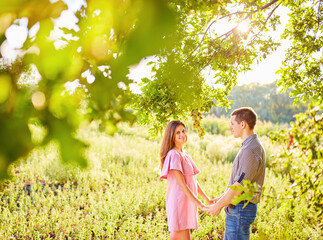 Fototapeta premium young couple in love having fun and enjoying the nature