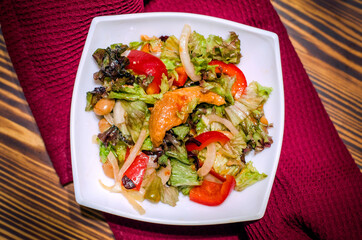 Salmon and beans salad with vegetables