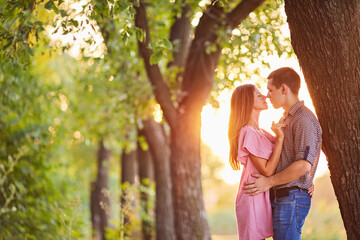 Portrait of young couple in summer