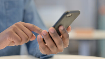 African Hands Using Smartphone, Close Up 
