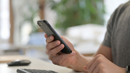 Close Up of Man Using Smartphone