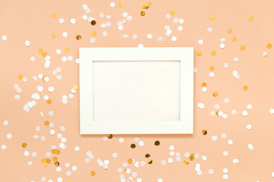 festive background white frame with confetti flat lay