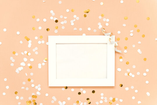 festive background white frame with confetti flat lay