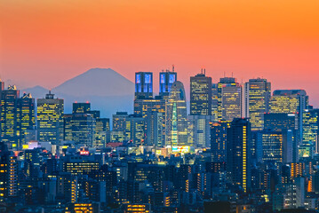 Tokyo, Shinjuku building cityscape and Mt. Fuji at Behind.