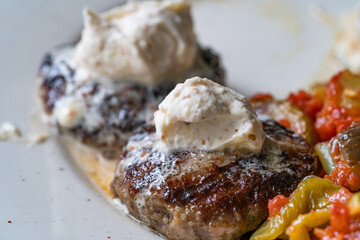 Balkan Cevapcici Kofta Kofte Kebab with Buttercream. Close up Macro View.