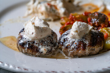 Balkan Cevapcici Kofta Kofte Kebab with Buttercream. Close up Macro View.