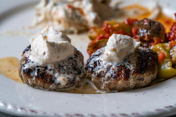 Balkan Cevapcici Kofta Kofte Kebab with Buttercream. Close up Macro View.