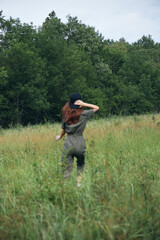 Woman Walk in the field Green grass fresh air 