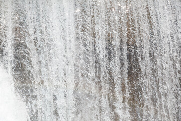 Waterfall water jets wall texture.