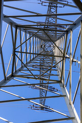 electric pylon under clear blue sky