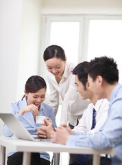 Group of business people discussing in office