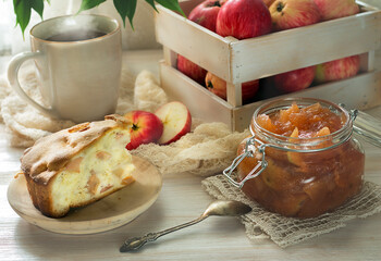 Homemade apple pie, apple jam and fresh apples.