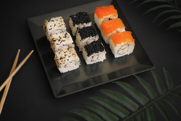 Set of rolls on plate. Japanese food.